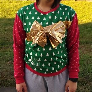 Ugly Christmas sweat shirt with a big gold bow